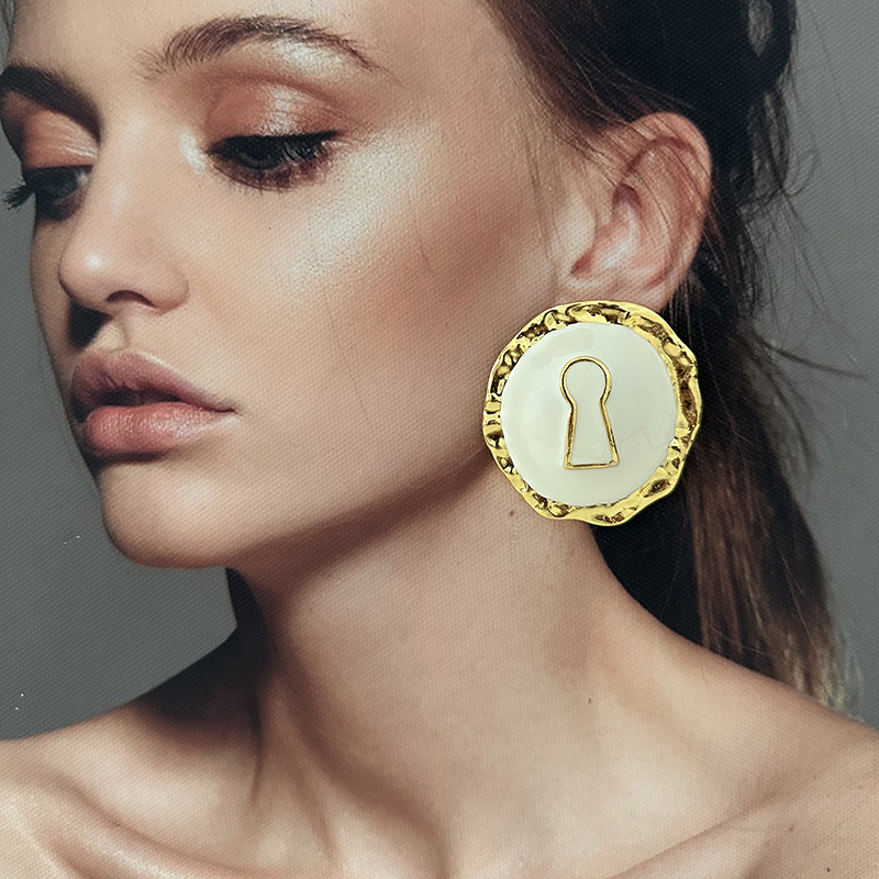 Boucles d'oreilles rondes en a - Vintage Fashion Collection avis et prix