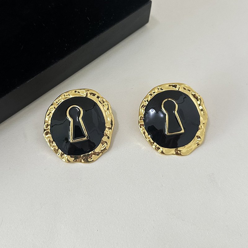Boucles d'oreilles rondes en a - Vintage Fashion Collection avis et prix